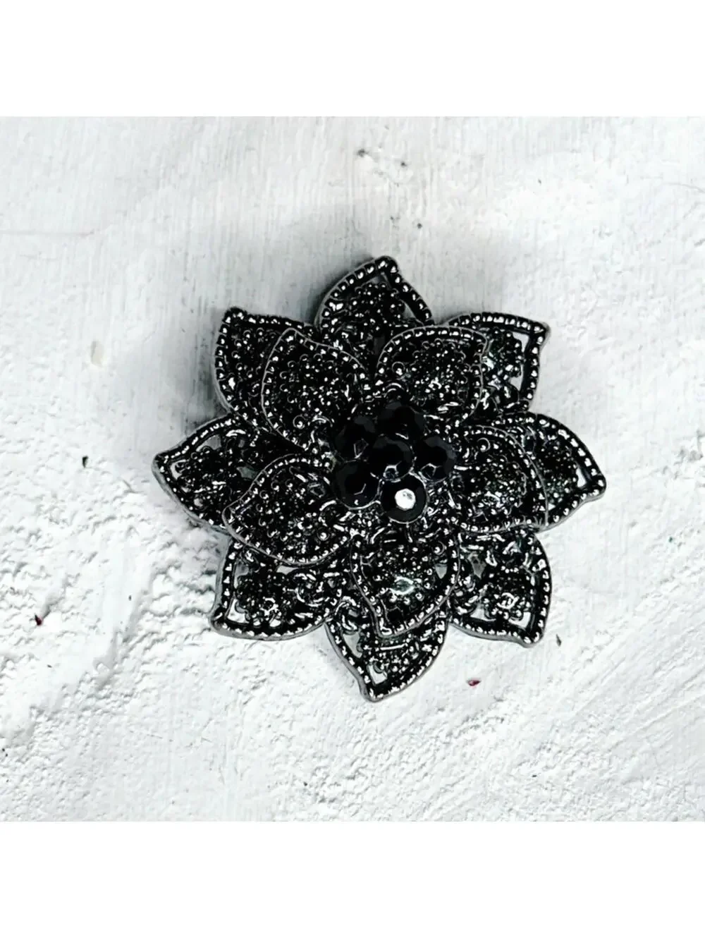 7569u. Gunmetal Flower Brooch